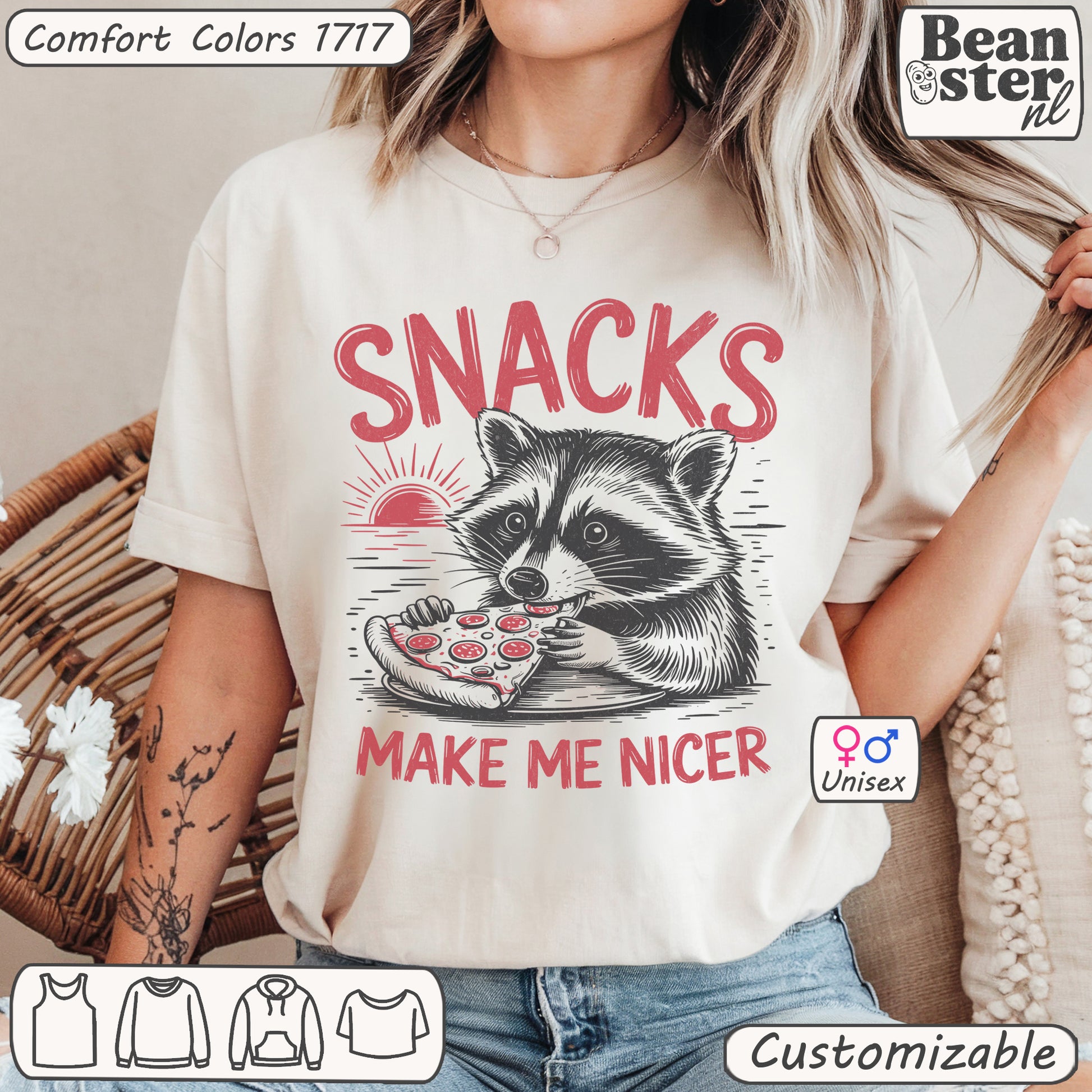 Funny raccoon graphic t-shirt with “Snacks Make Me Nicer” slogan