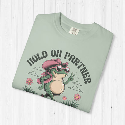 Hold On Partner I’m Growing a Little Buckaroo T-Shirt 🐸