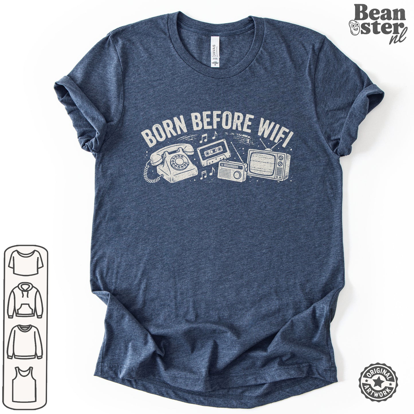 A heather navy blue t-shirt with a white graphic print reading 'BORN BEFORE WIFI' above retro telephone, cassette tape, radio, and TV illustrations. 