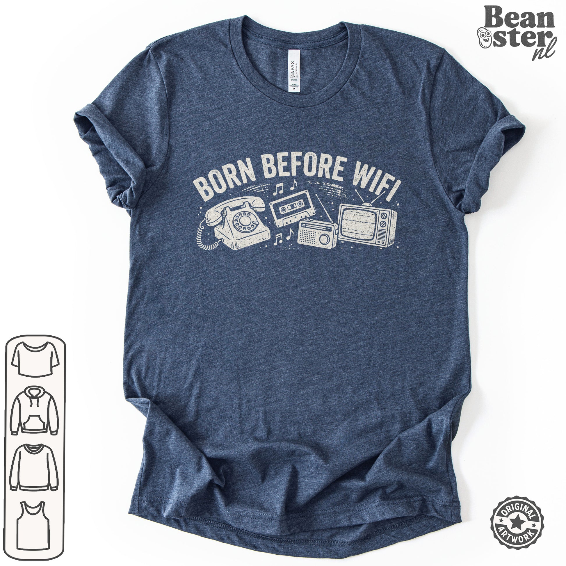 A heather navy blue t-shirt with a white graphic print reading 'BORN BEFORE WIFI' above retro telephone, cassette tape, radio, and TV illustrations. 