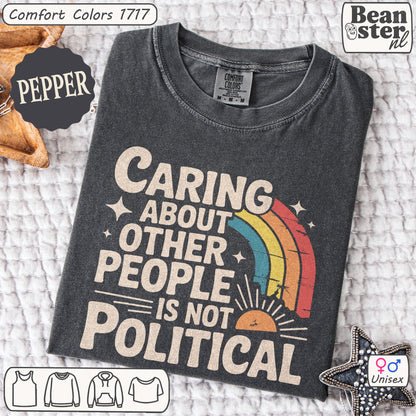 Gray t-shirt with rainbow design and text on a textured surface, featuring the brand 'Beanster'.