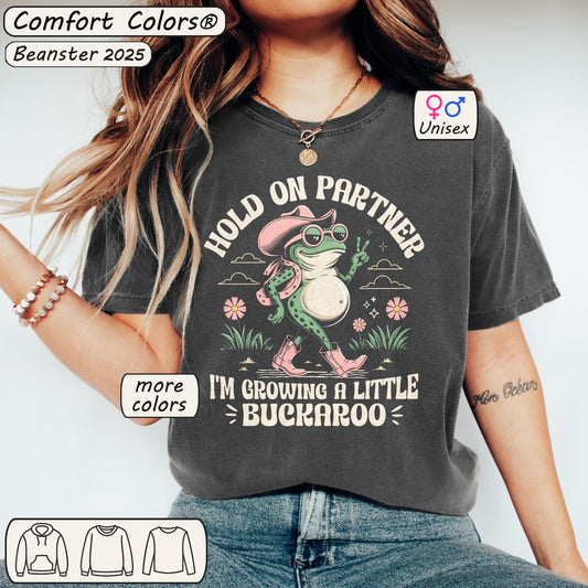 Hold On Partner I’m Growing a Little Buckaroo T-Shirt 🐸