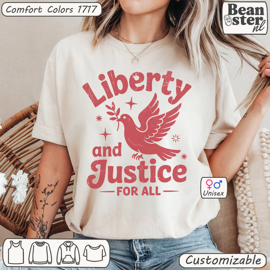 Person wearing a t-shirt with 'Liberty and Justice for All' design, featuring a dove graphic.