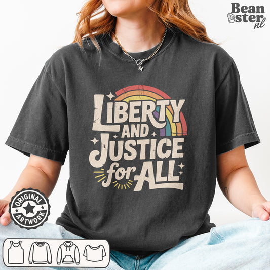 Person wearing a black t-shirt with 'Liberty and Justice for All' text and rainbow design.
