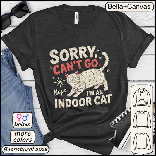 Black t-shirt with a cat graphic and text 'Sorry, can't go nope, I'm an indoor cat' on a white background.