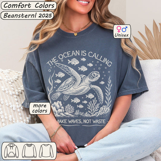 Person wearing a blue t-shirt with a turtle graphic and text, sitting on a couch.
