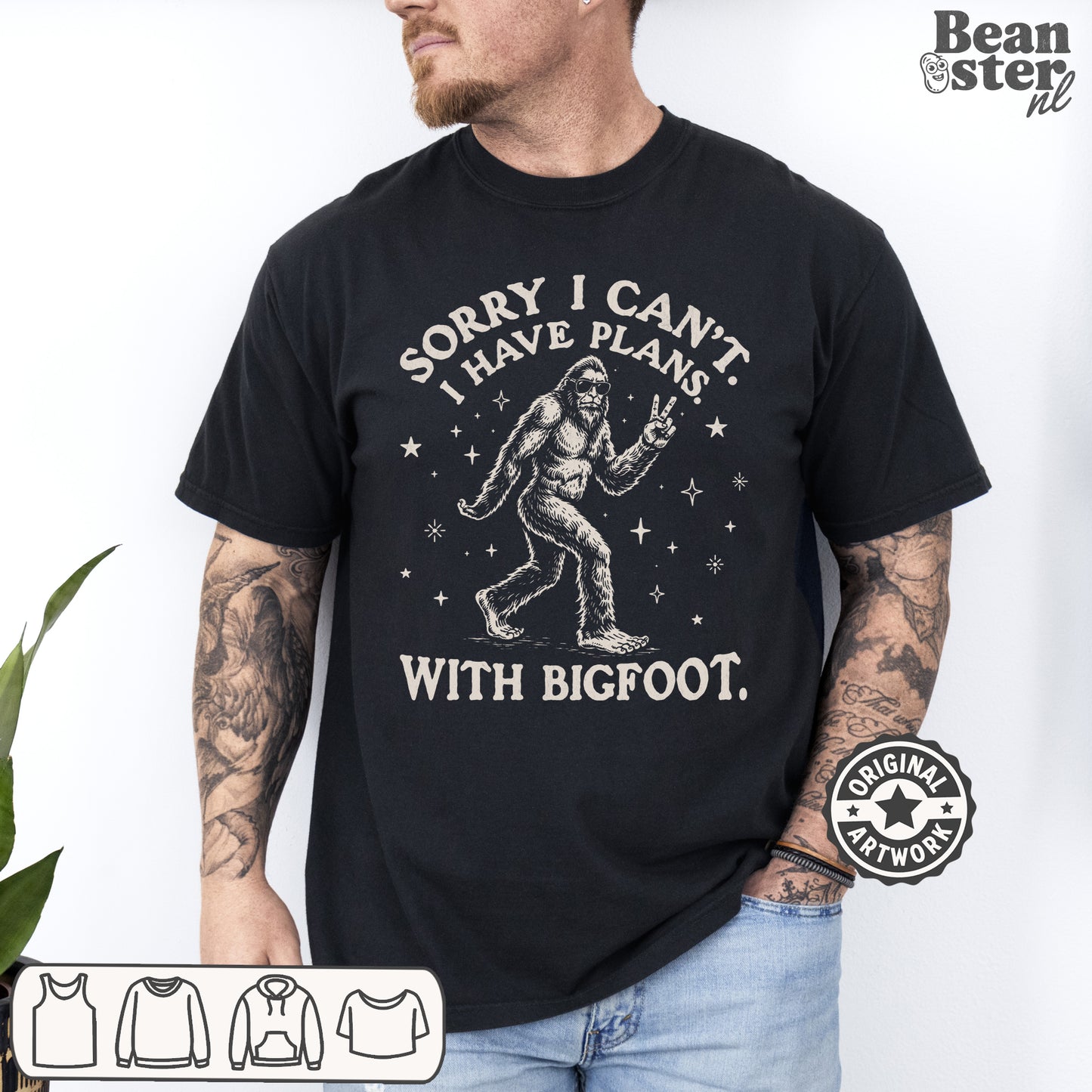 Black graphic tee reading I Can't I Have Plans With Bigfoot, funny cryptid humor