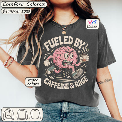 Person wearing a t-shirt with a brain graphic and text 'Fueled by Caffeine & Rage' from Comfort Colors.