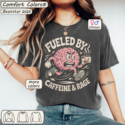Person wearing a t-shirt with a brain graphic and text 'Fueled by Caffeine & Rage' from Comfort Colors.