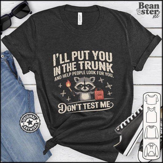 Black t-shirt with a raccoon graphic and humorous text on a white background