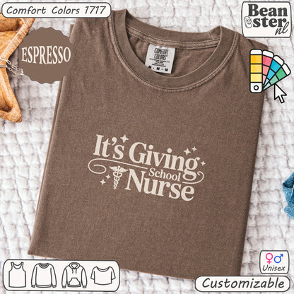 Brown t-shirt with 'It's Giving School Nurse' text on a textured surface