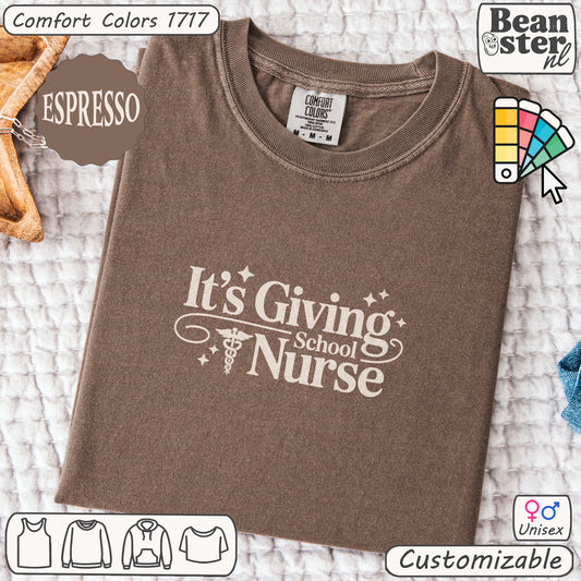 Brown t-shirt with 'It's Giving School Nurse' text on a textured surface