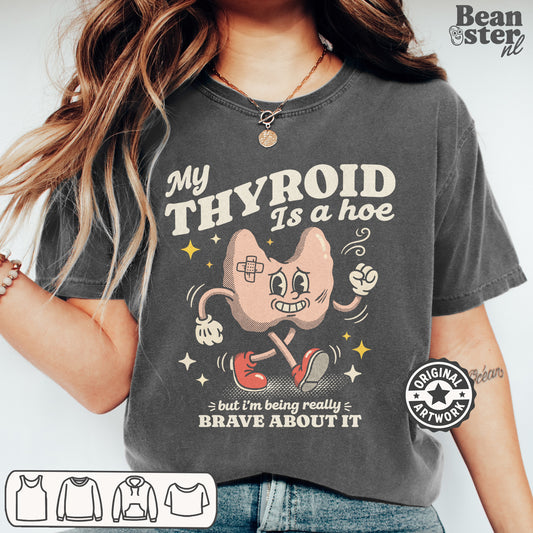 Black t-shirt with “My Thyroid Is A Hoe” funny thyroid humor quote design