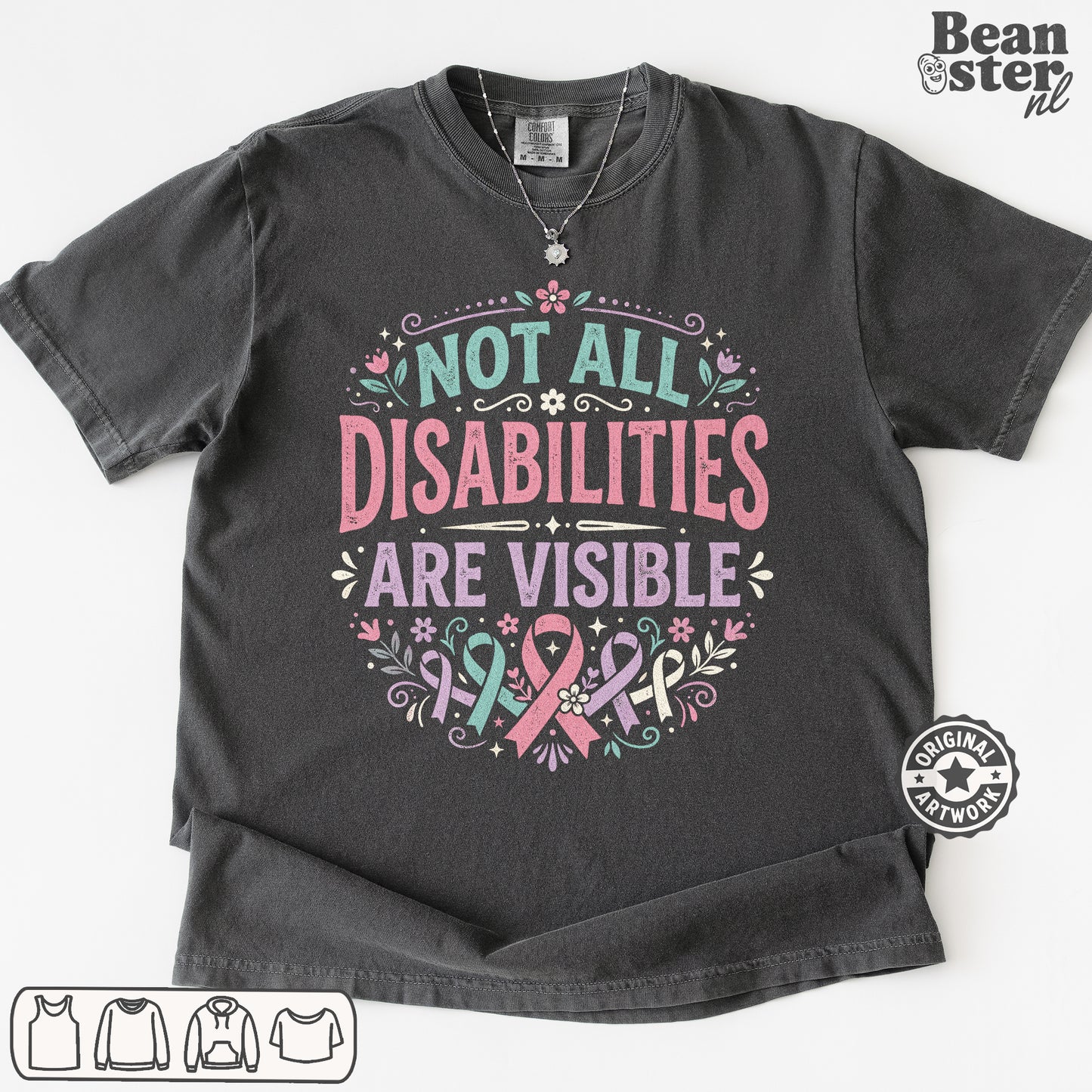 A dark charcoal gray graphic t-shirt laid flat on a white background. The shirt features a printed design with the text 'NOT ALL DISABILITIES ARE VISIBLE' in pink and teal lettering, decorated with pink and teal awareness ribbons, flowers, and leaves.