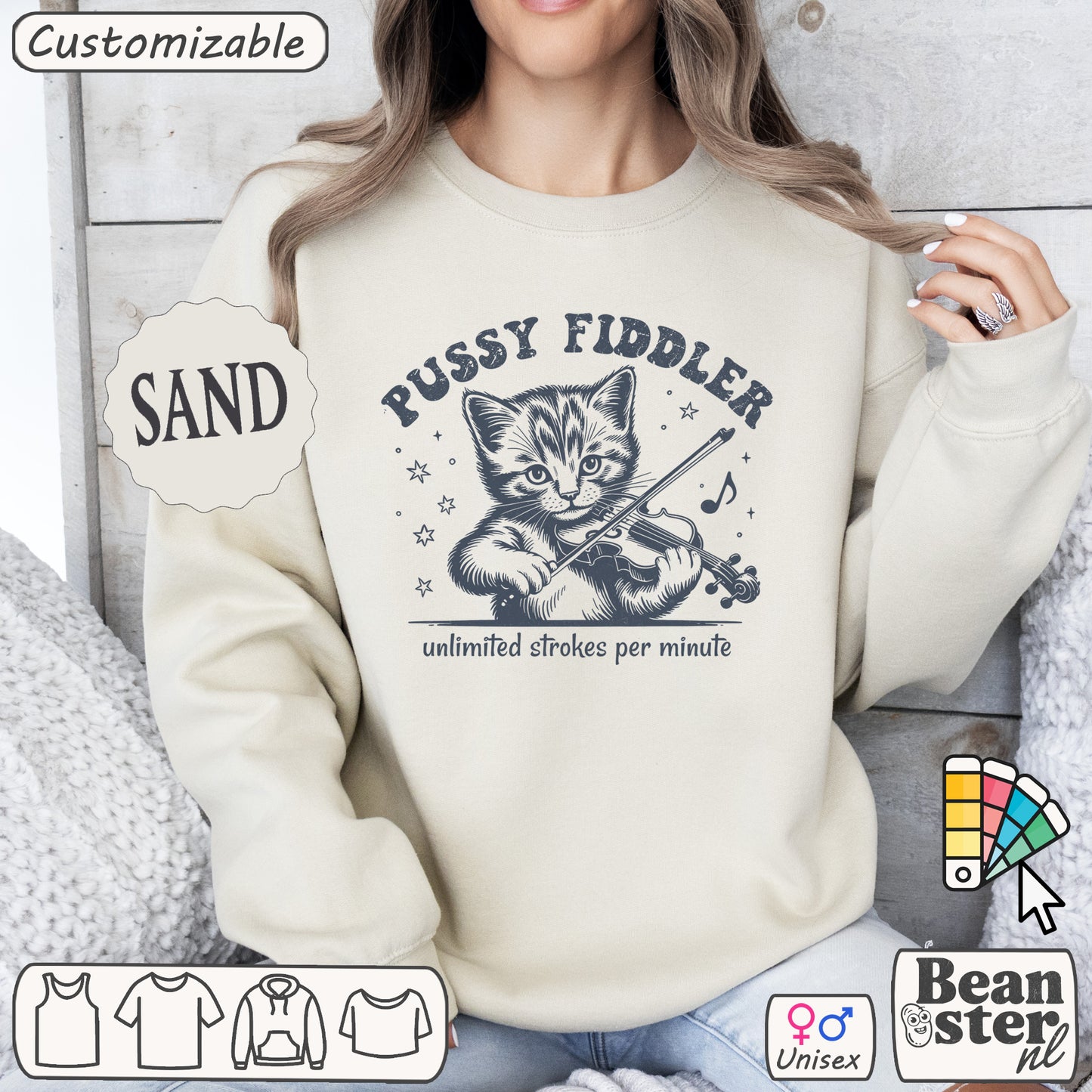 Person wearing a sweater with a graphic of a kitten playing a fiddle and text 'Pussy Fiddler'.