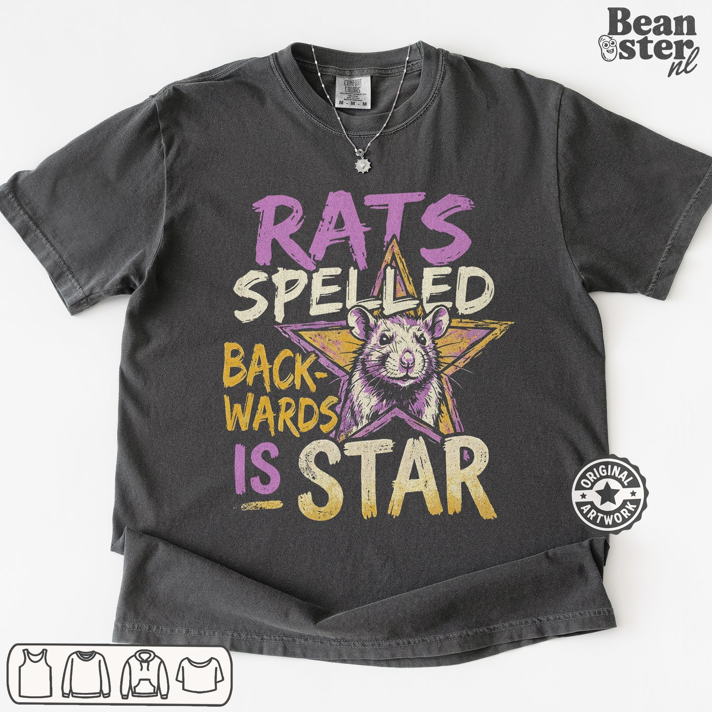 A dark gray graphic t-shirt featuring a distressed print with the text 'RATS SPELED BACKWARDS IS STAR' and a cartoon rat inside a star. The t-shirt is laid flat on a white background with a 'Beanster.