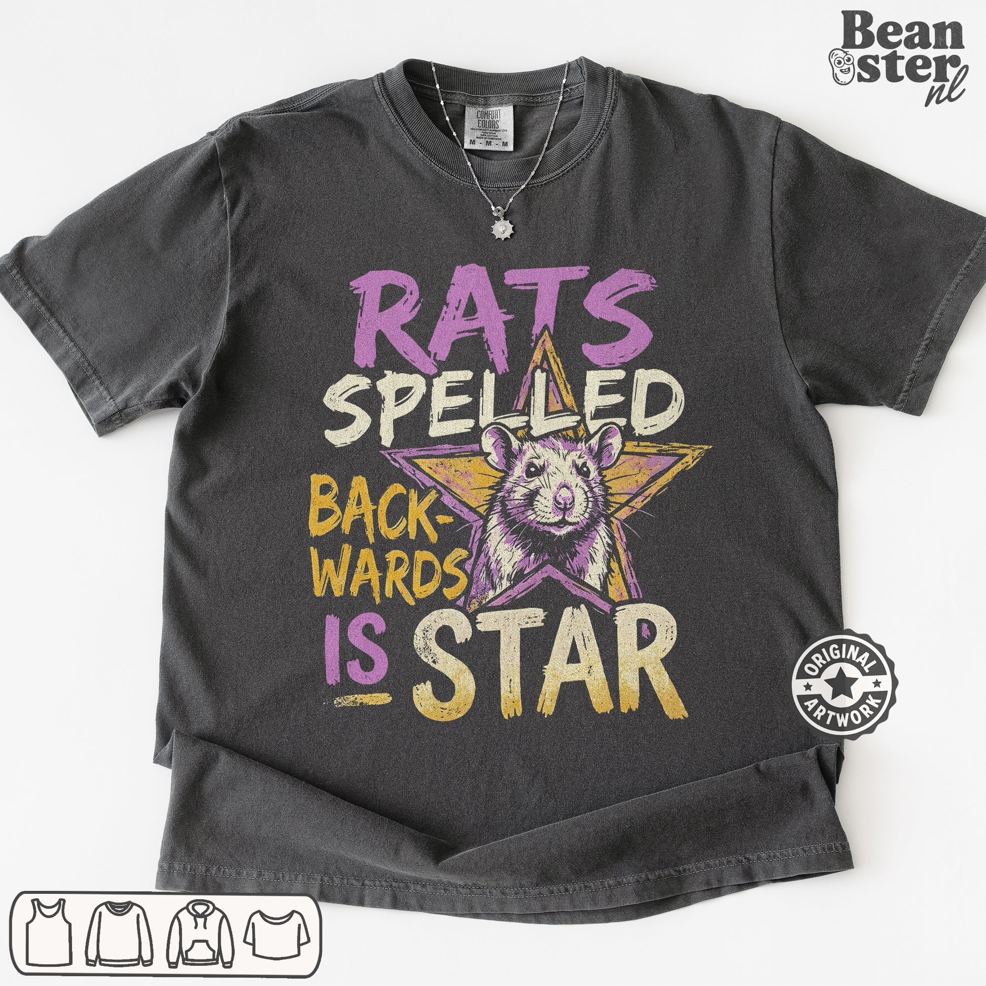 A dark gray graphic t-shirt featuring a distressed print with the text 'RATS SPELED BACKWARDS IS STAR' and a cartoon rat inside a star. The t-shirt is laid flat on a white background with a 'Beanster.