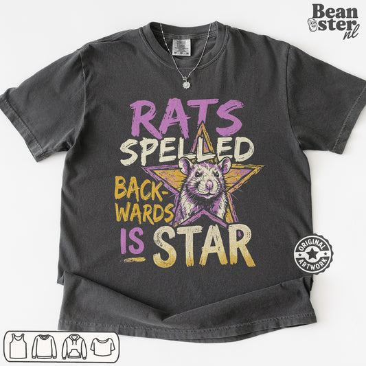 A dark gray graphic t-shirt featuring a distressed print with the text 'RATS SPELED BACKWARDS IS STAR' and a cartoon rat inside a star. The t-shirt is laid flat on a white background with a 'Beanster.