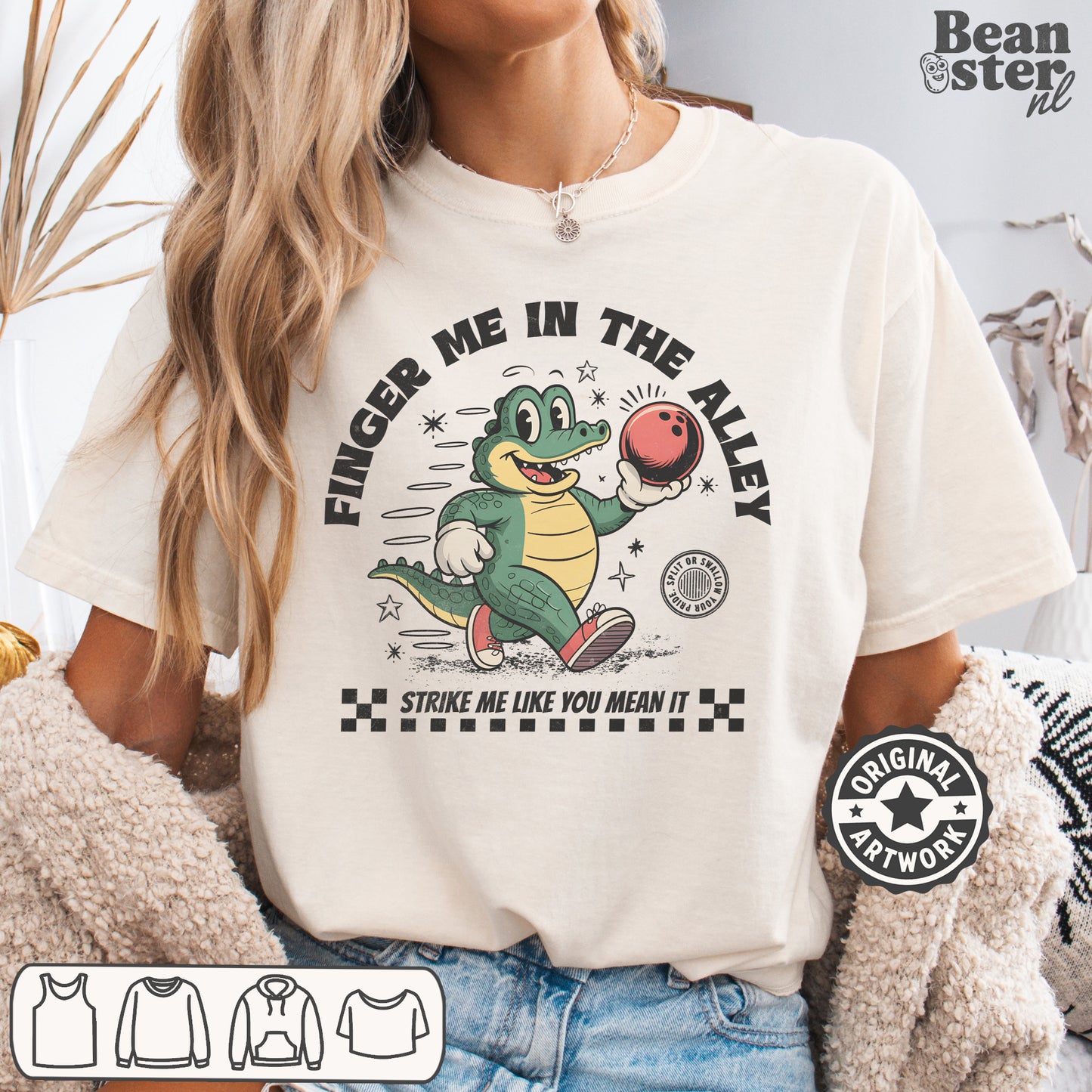 Person wearing a t-shirt with a graphic of a crocodile and text 'Finger me in the alley, strike me like you mean it' with Beanster.nl branding.
