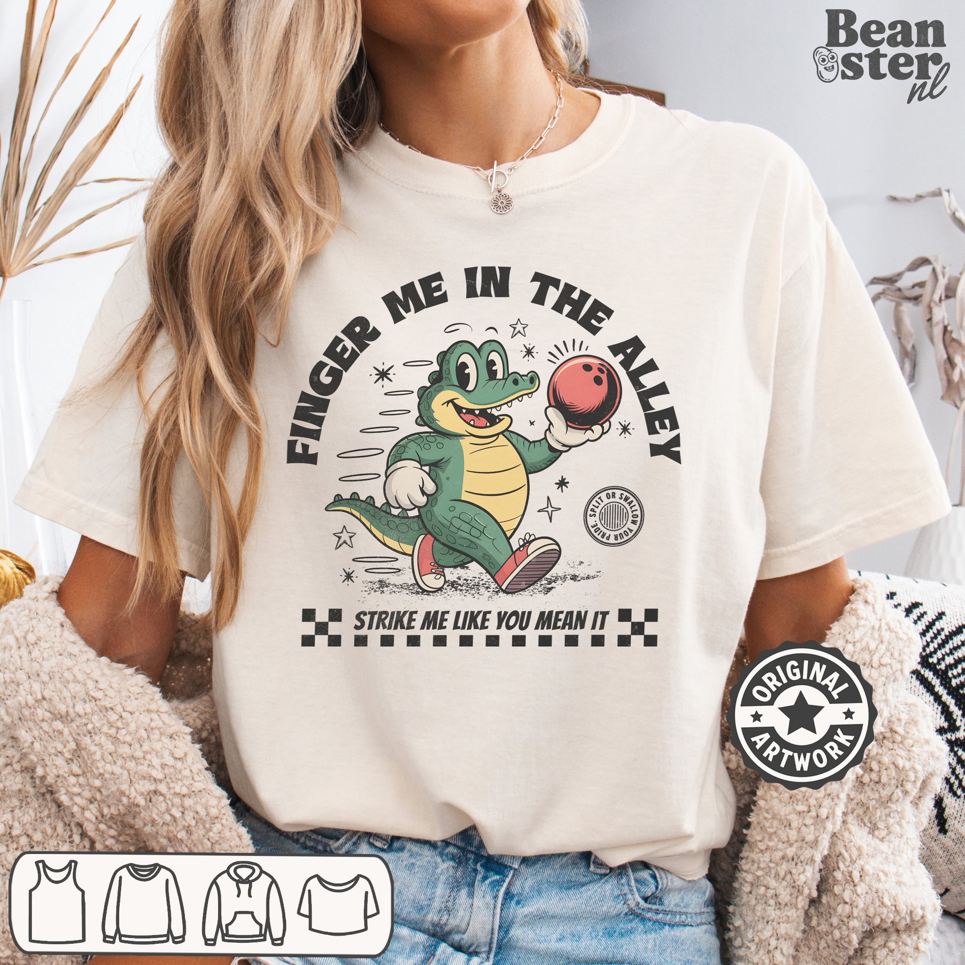 Person wearing a t-shirt with a graphic of a crocodile and text 'Finger me in the alley, strike me like you mean it' with Beanster.nl branding.