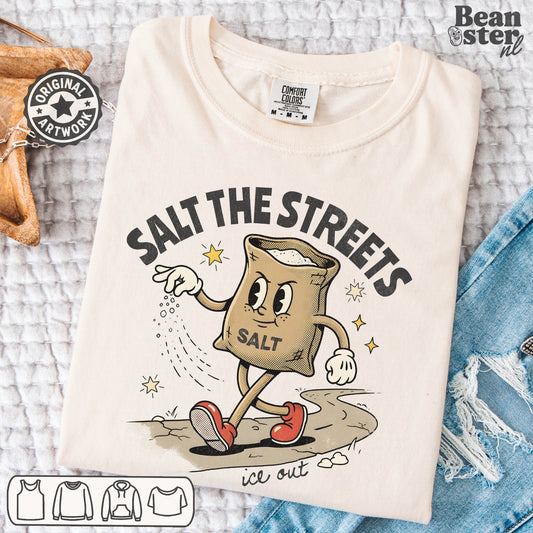 Black streetwear t-shirt reading Salt The Streets with bold graphic print and subtle activist meme style