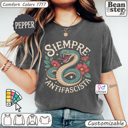 Close-up of floral snake graphic on Siempre Antifascista t-shirt